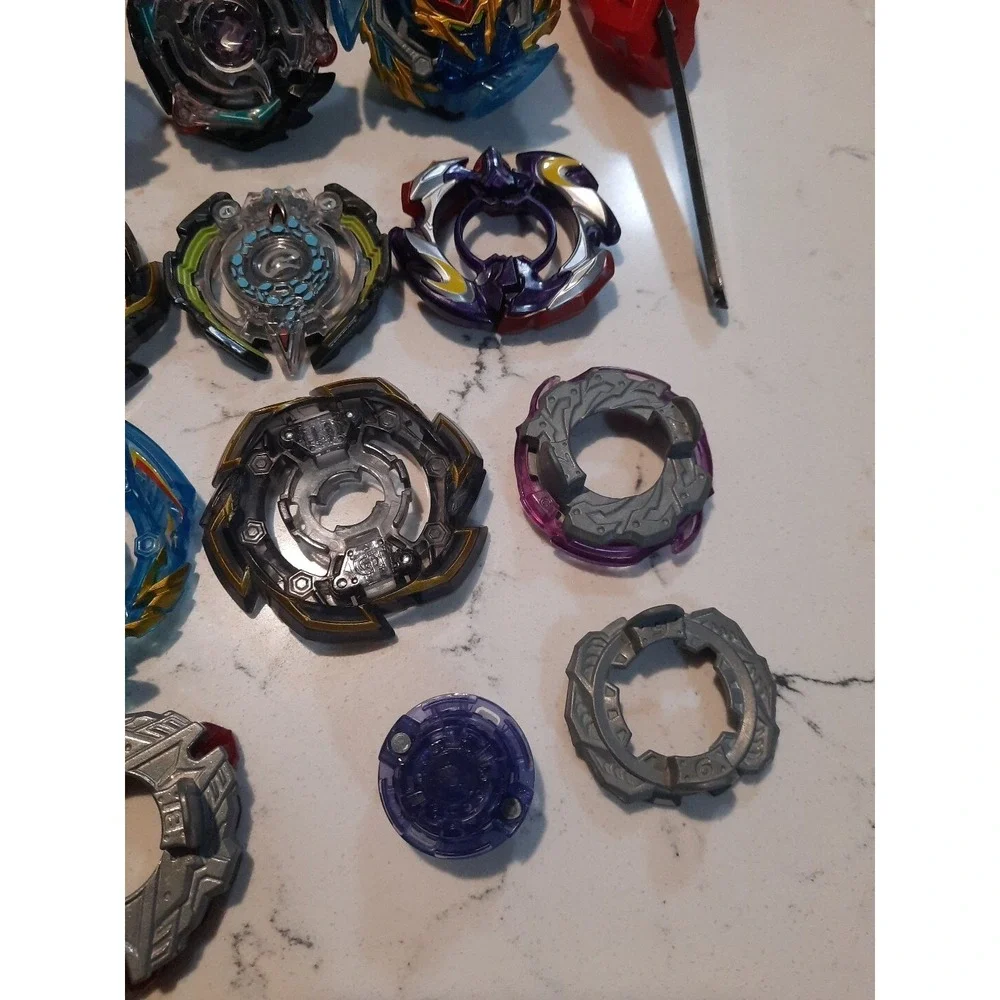 Lot Of 8 Beyblade And Different Parts